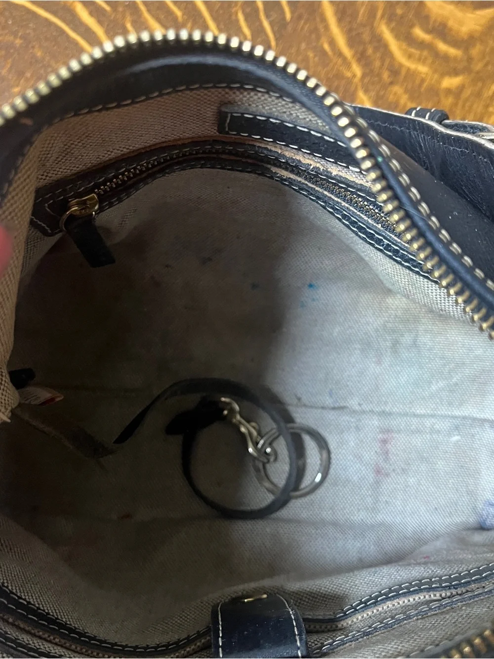 Dooney & Bourke Black Leather Hobo Shoulder Bag with Contrast Stitching